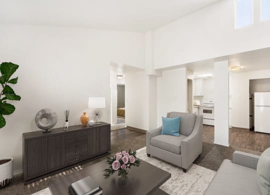 a living room with two couches and a coffee table at Park View Apartments, Wenatchee Washington
