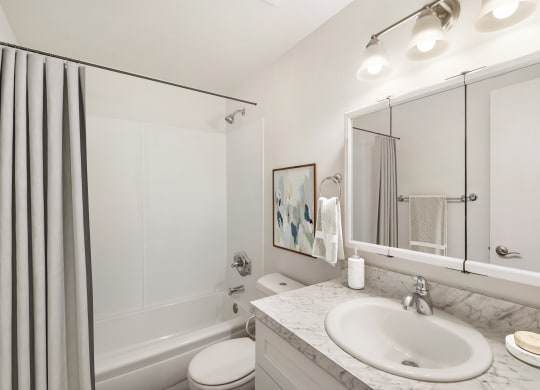 a bathroom with a bathtub and a sink at Park View Apartments, Washington, 98801