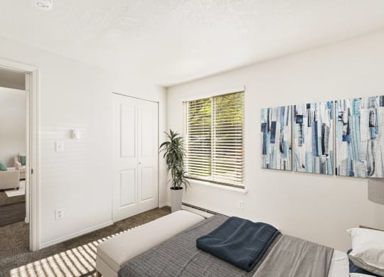 a bedroom with a bed and a window at Park View Apartments, Wenatchee, 98801