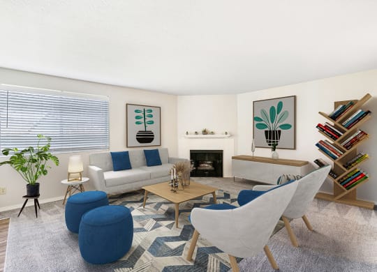 Living room with a large window on the left wall, a fireplace, and mantle in the center staged with a couch, chairs, and coffee table.at Capitol Crossing, Olympia, WA 98501