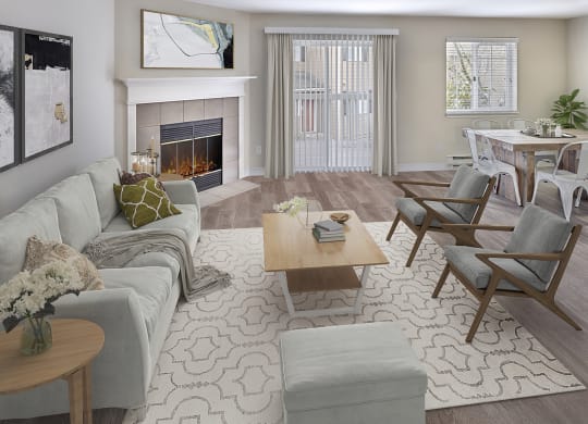 Apartment living room with a wood burning fireplace and staged furniture. Right off the living room are doors to the outdoor patio at Arterra Apartments, Kent, 98030
