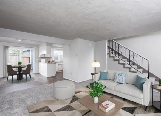 a living room with a couch and a table