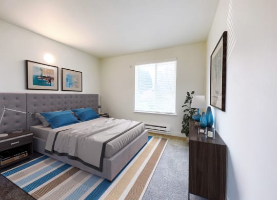a bedroom with a bed, a dresser, 2 side tables and a large sunny window.at The Trail, Snohomish