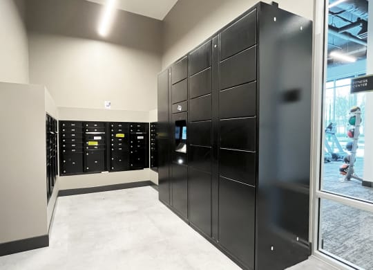a bunch of lockers in a room with a window at The Duo, University Place, WA 