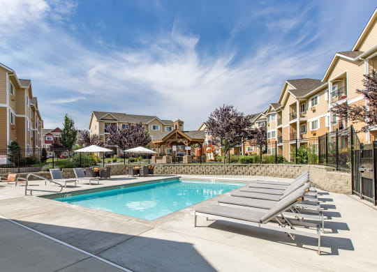 our apartments have a resort style pool with lounge chairs. apartments with pool in West Richland