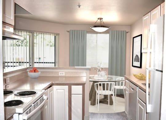 Kitchen with a fridge and stove with a cooktop looking out to the dining area which has a round glass table and chairs, an overhead light, and glass doors leading outside.at Sitka Heights, Fife, WA