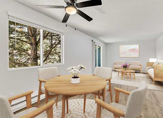 A living room with a wooden table and chairs.