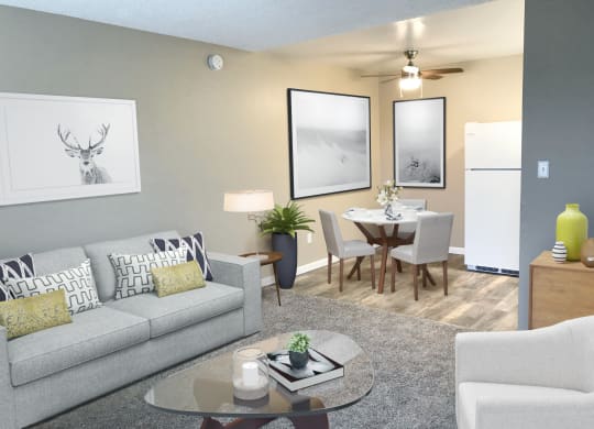 a living room and dining room with a couch and a table at Woodland Crossing , Woodland