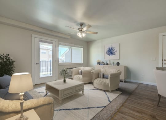 a living room with white furniture and a ceiling fan at Madison Park, Bozeman, MT, 59718