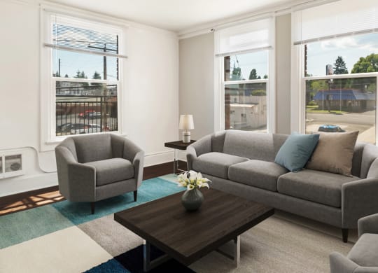 a living room with couches chairs and a coffee table