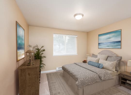 a bedroom with a bed and a painting on the wall