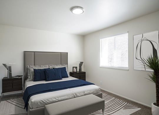 a bedroom with a bed and two night stands at Summit, Pocatello, ID