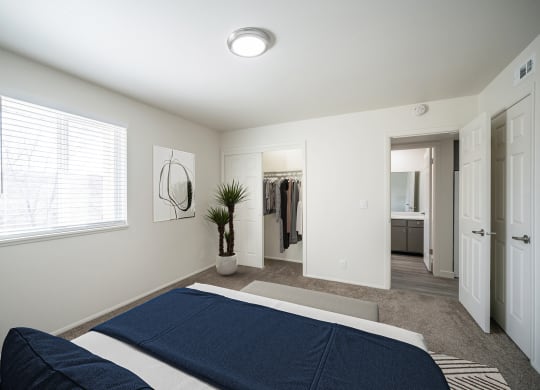 a bedroom with a large bed and a large window at Summit, Idaho