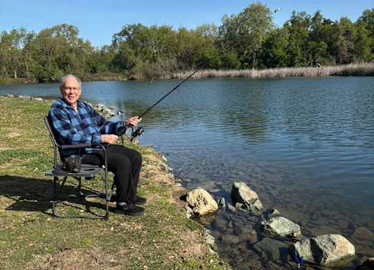 A man is fishing at Lodi Commons Senior Living, Lodi, CA