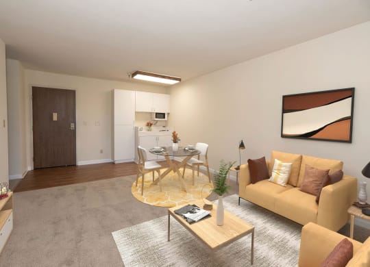 a living room and dining room with a table and chairs at Hilltop Commons Senior Living, Grass Valley