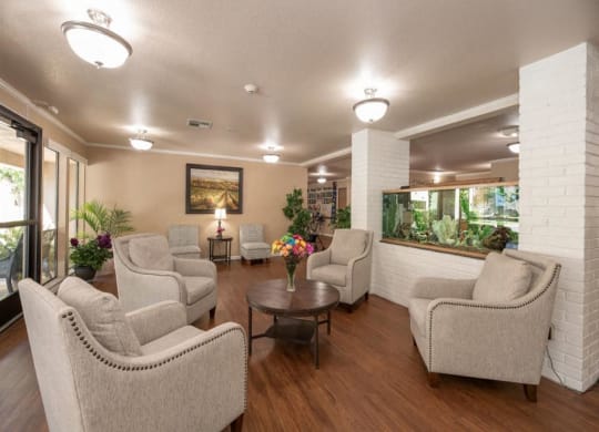 Seating area in lobby with chairs at Lodi Commons Senior Living, Lodi, 95240