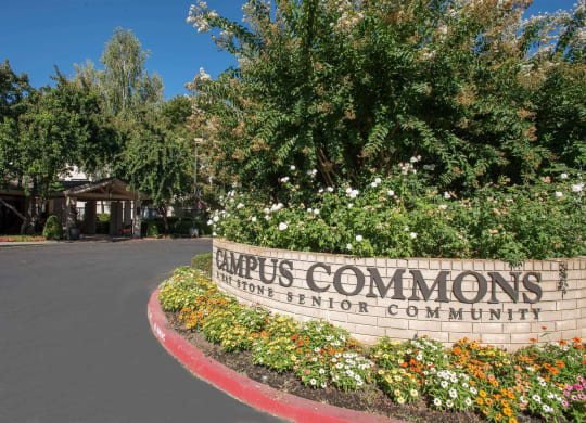 Campus Commons Front Entrance Sign and Building at Campus Commons Senior Living, Sacramento