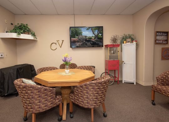 a dining room with a table and chairs at Castle Vista Senior Duplex Community, Atwater, CA, 95301