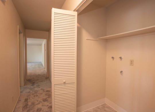 a walk in closet and a hallway in a house at Castle Vista Senior Duplex Community, Atwater, California