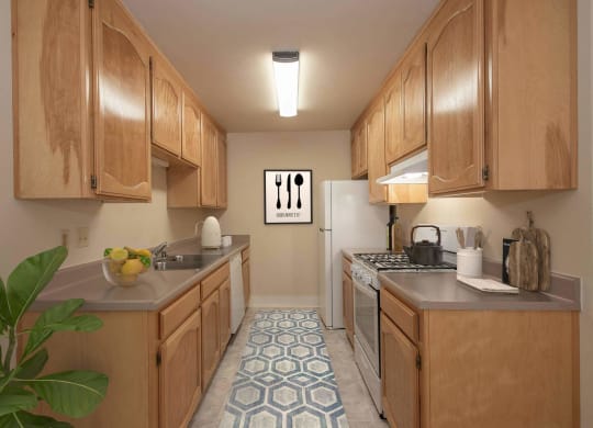 a kitchen with wooden cabinets and a white refrigerator at Castle Vista Senior Duplex Community, Atwater, CA, 95301