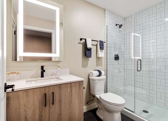 a bathroom with a toilet sink and shower at Textile Apartments, Cincinnati, OH, 45202