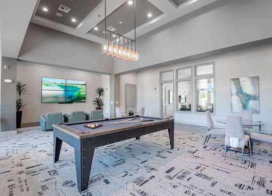 a game room with a ping pong table at Discovery at Craig Ranch, McKinney, 75070