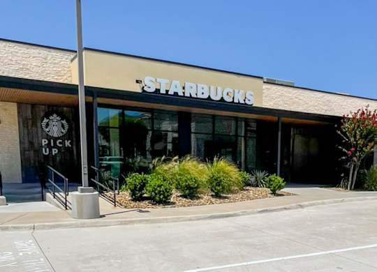 A Starbucks storefront with the words at Craig Ranch, McKinney, TX.