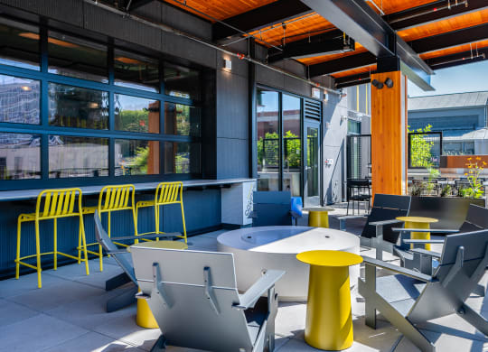 outdoor patio area with tables and chairs