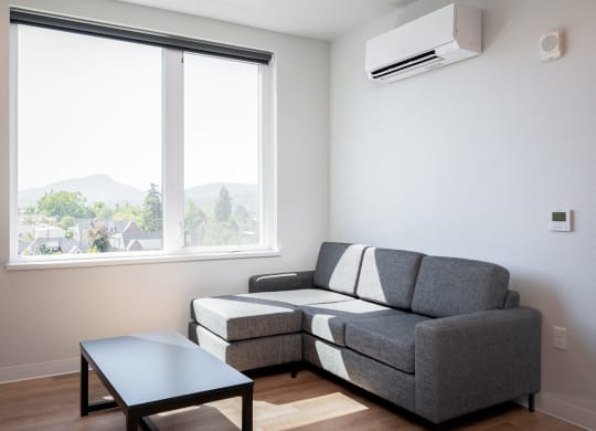 a living room with a couch and a coffee table