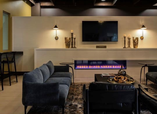 a living room with a couch and a tv