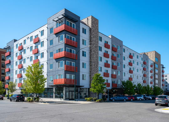 Apartments in Everett WA - The Waterline - Exterior View of The Apartment Building with Lush Landscaping