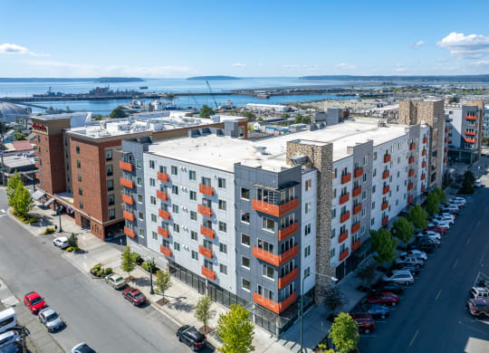 Apartments in Everett WA - The Waterline - Exterior View of The Apartment Building with Lush Landscaping