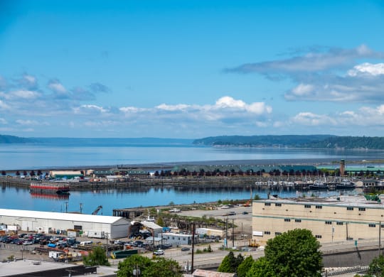 Apartments in Everett WA - The Waterline - Exterior View of The Apartment Building with Lush Landscaping
