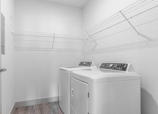 A laundry room with a washer and dryer.