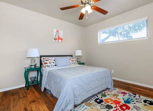 Bedroom With Ceiling Fan at Boston Woods Apartments, San Antonio TX, 78201