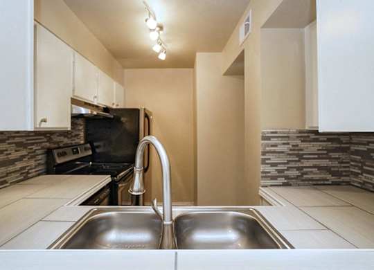 Double Stainless Steel Sink at Boston Woods Apartments, San Antonio TX. 78201