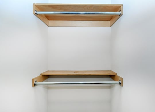 Two shelves on a wall.