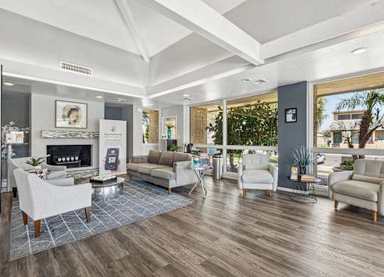 A living room with a fireplace and a couch.