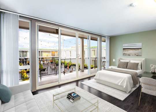A bedroom with a large bed and a balcony with a view of the outside.