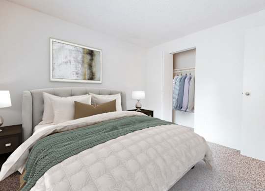 A bedroom with a large bed and a painting on the wall.