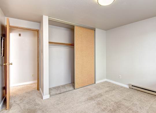 Seattle Apartments-  a bedroom with a large closet, spacious layout