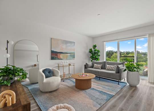 a living room with couches and chairs and a table at Baldwyn, Seattle, 98125