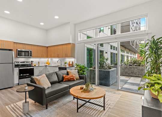 a living room with a couch and a table at Baldwyn, Washington, 98125