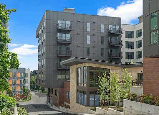 a view of an apartment building with a street in front of it at Baldwyn, Washington, 98125