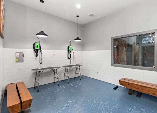 A room with a bench, a table and a window. at Northpoint Apartments, Washington, 98407