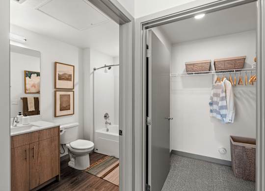 a bathroom with a shower and a toilet and a sink at Gage On Sixth, Tacoma, WA