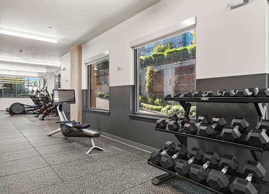 a gym with weights and a window in a building at Baldwyn, Washington