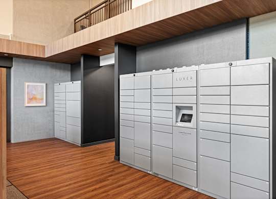 a room filled with white boxes on a wooden floor at Baldwyn, Seattle Washington