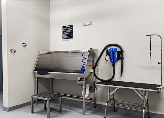 a sink and a machine in a room at Baldwyn, Seattle, 98125