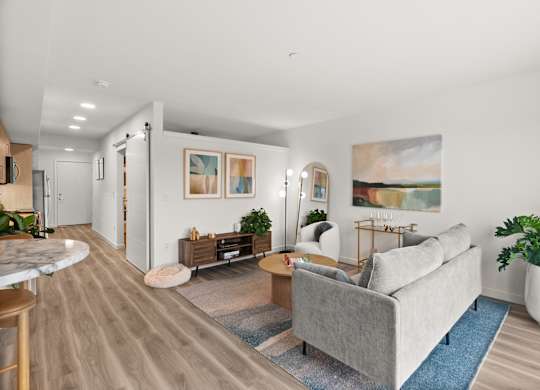 a living room with a couch and a table